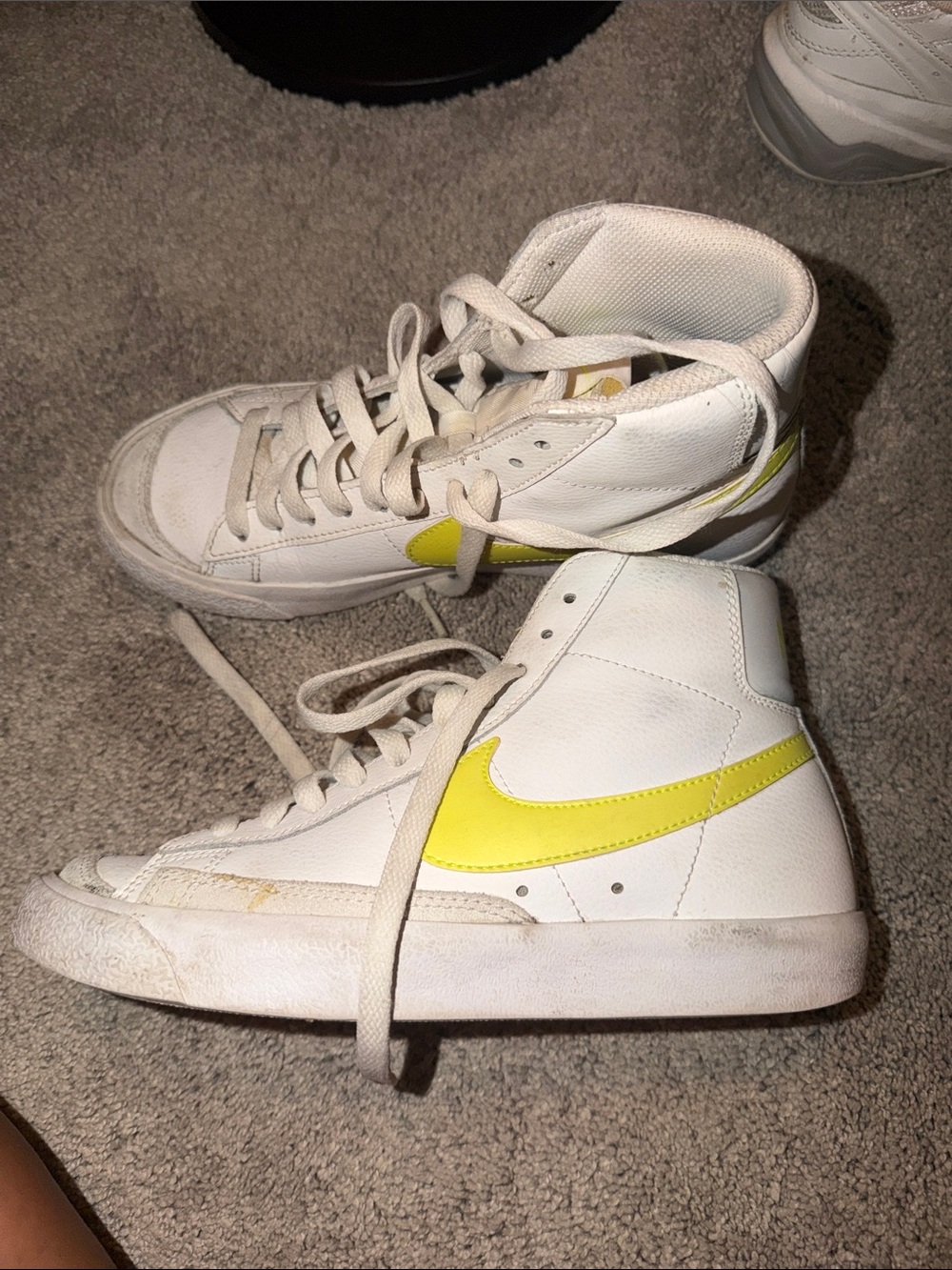 Nike Women's White High-Top Sneakers with Yellow Swoosh